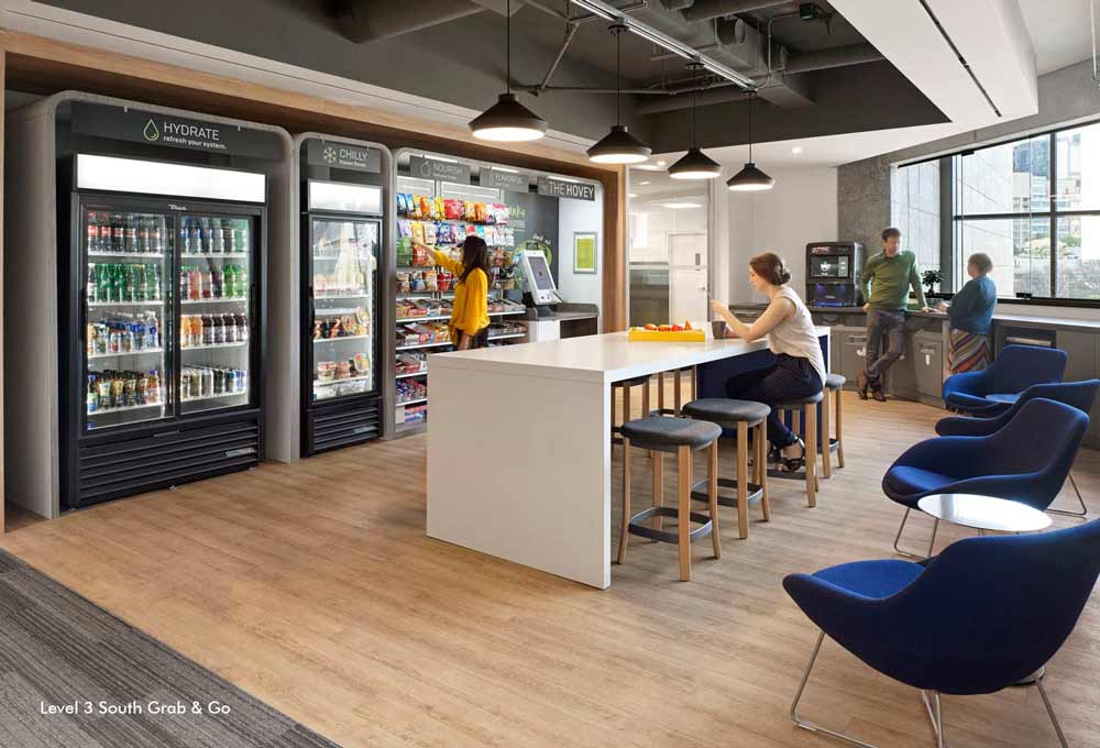 Grab and Go concept and eating area featuring a bar seating area and modern lounge area