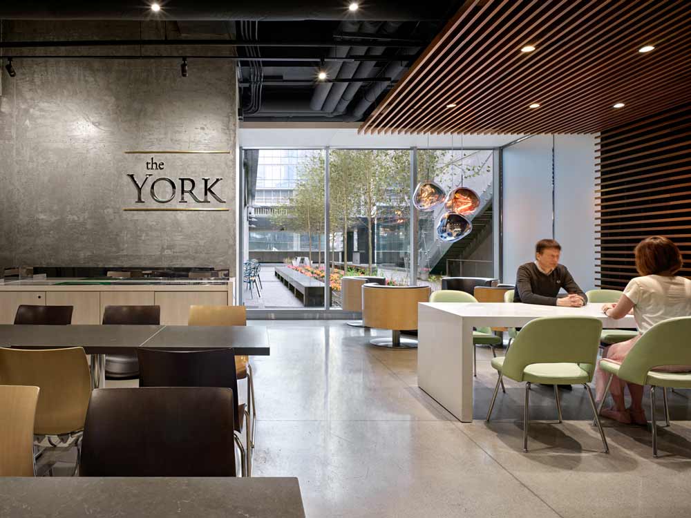 Tables and chairs provided for either work and collaboration or eating, with plenty of seating spaces