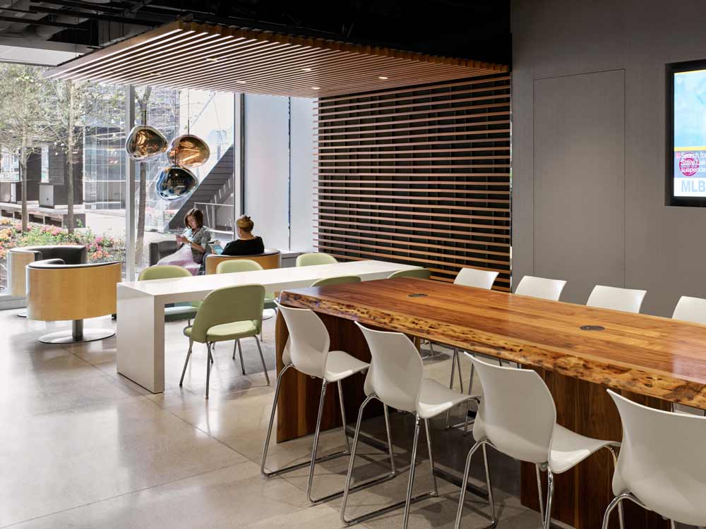 Tables and chairs provided for either work and collaboration or eating, with plenty of seating spaces