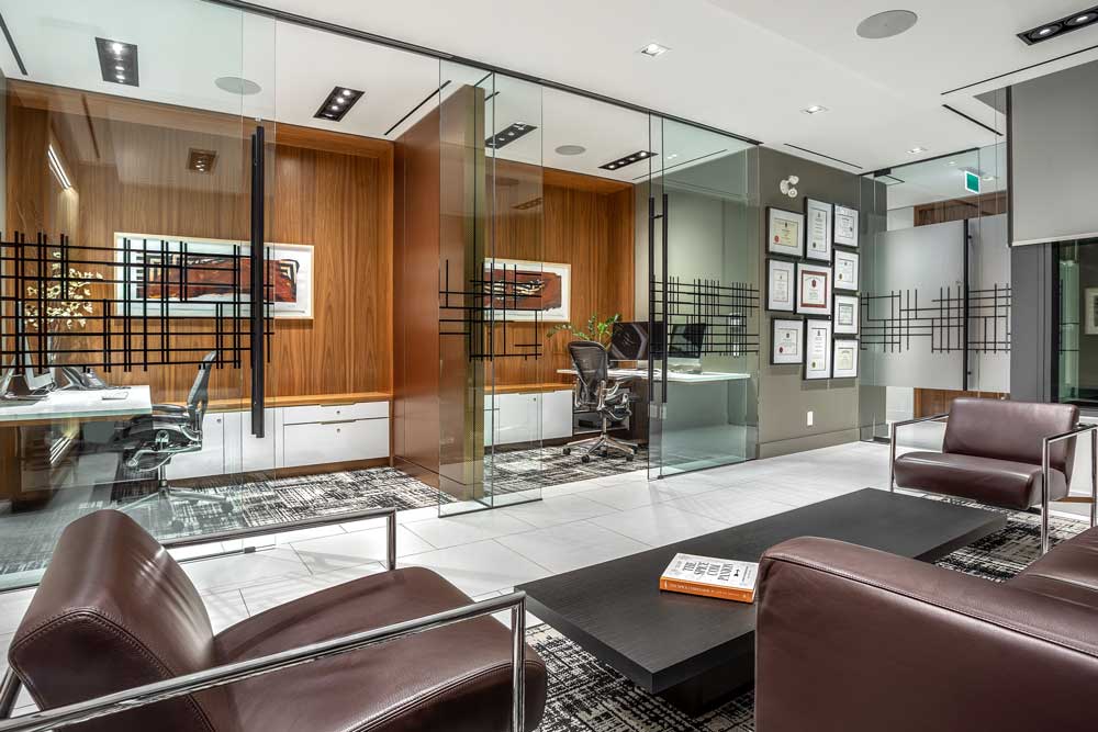 Waiting area looking toward the glass enveloped offices across