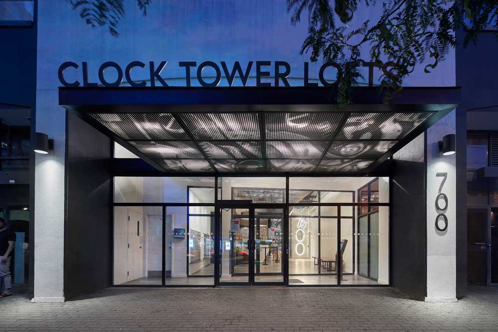 Exterior canopy with new modern signage and clock detail graphic