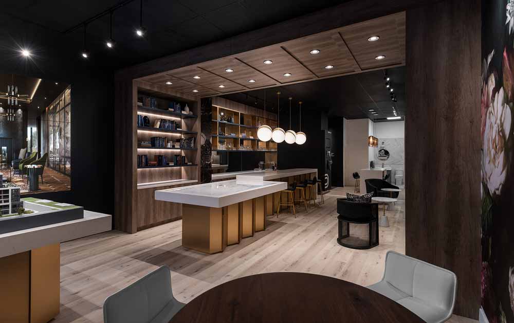 A view of the bar area and lounge in this presentation space that is a perfect example of modernizing the traditional with inspiration drawn from Ted Baker.