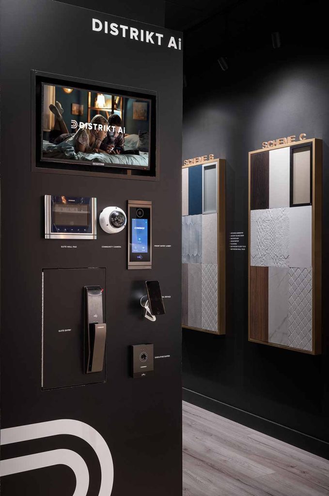 A working model of the condo’s personal AI assistant is prominently featured beyond the lounge