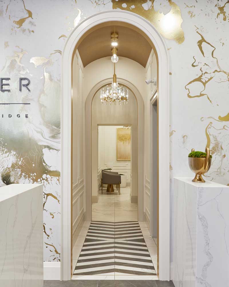 Archway leading to a narrow hallway