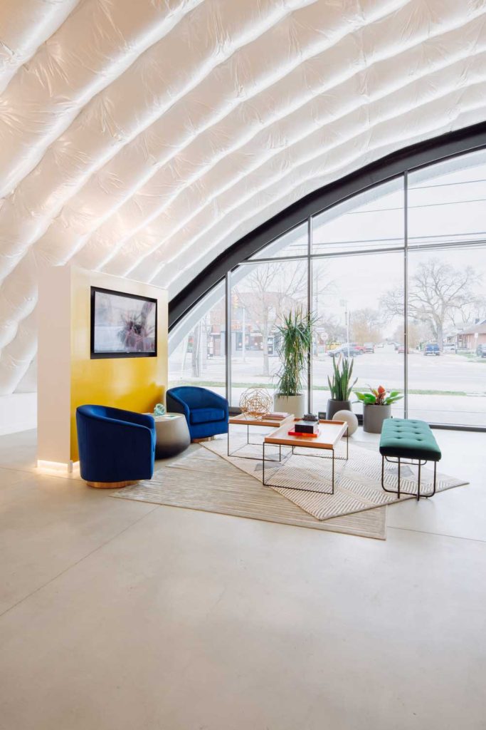 Colourful lounge area in the central area of the sales centre