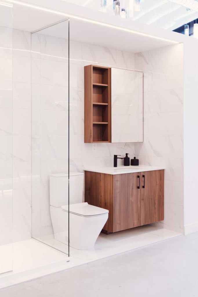Vignette of the bathroom design in a wood and white palette