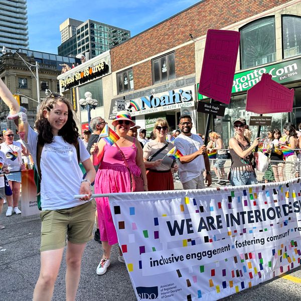 Image of ARIDO at last year's Pride Parade with the banner saying 'We Are Interior Design'